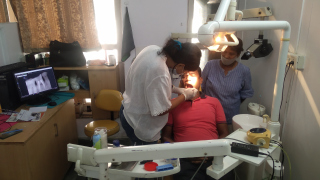 Patient-receiving-Dental-treatment-at-Maanas-Dispensary